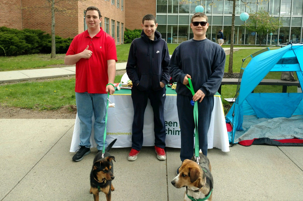 Image of Green Chimneys School students with rescue dogs at a community event