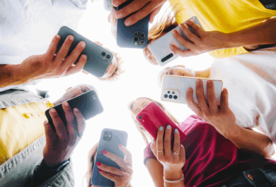 Representation of a group of teens each using a smartphone